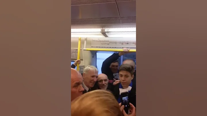 United legend paddy crerand on tube with United fans