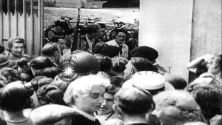 British Lancasters bomb at Brest, Canadian troops advance, civilians buy goods an...HD Stock Footage