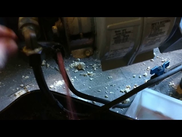 Restarting a Burnham V8 oil boiler with air in the fuel line - YouTube
