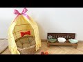 黒猫のジジに鳥カゴの形のベッド作ったよ