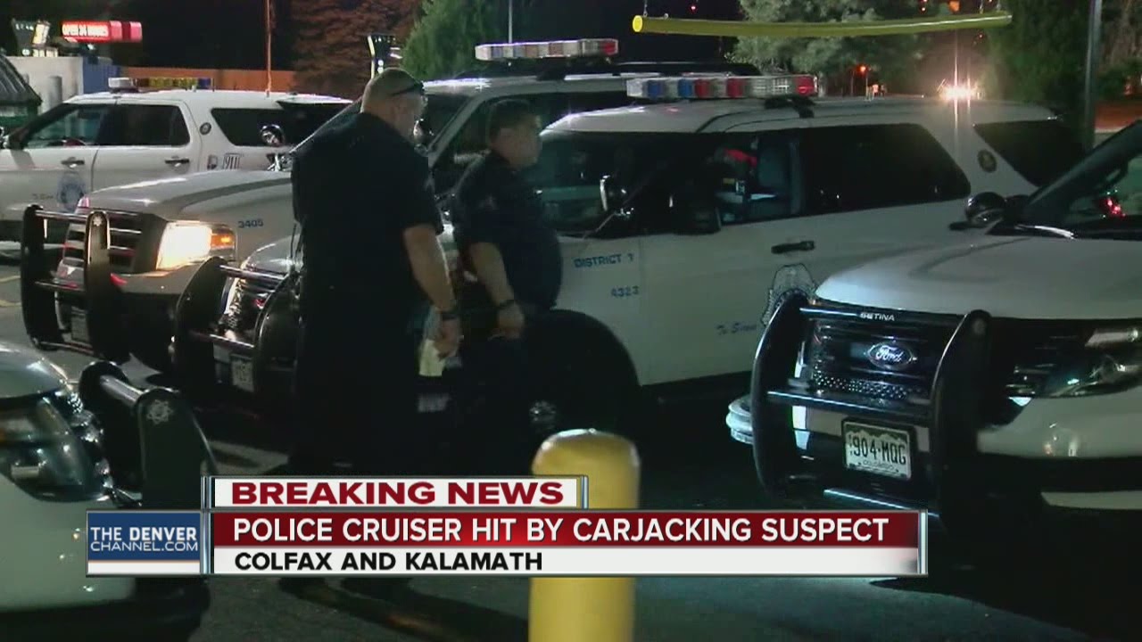 Carjacking suspect hits Denver Police cruiser - YouTube