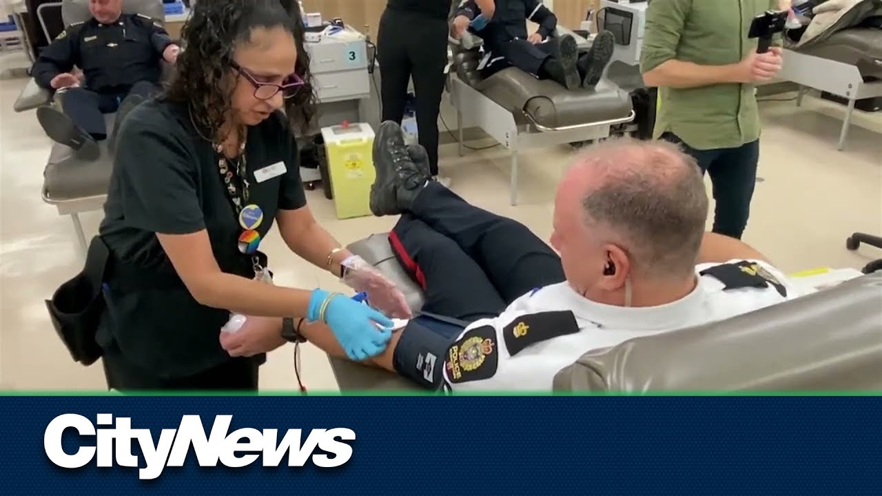 Edmonton first responders donate blood - YouTube