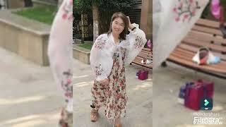 A disabled woman with polio walks with a leg orthosis #polio