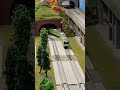 トンネルから出てくる201系