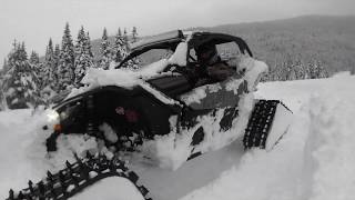 Can am X3 with backcountry tracks in 5+ feet of fresh snow