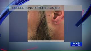Correction officer slashed by gang member at Rikers Island