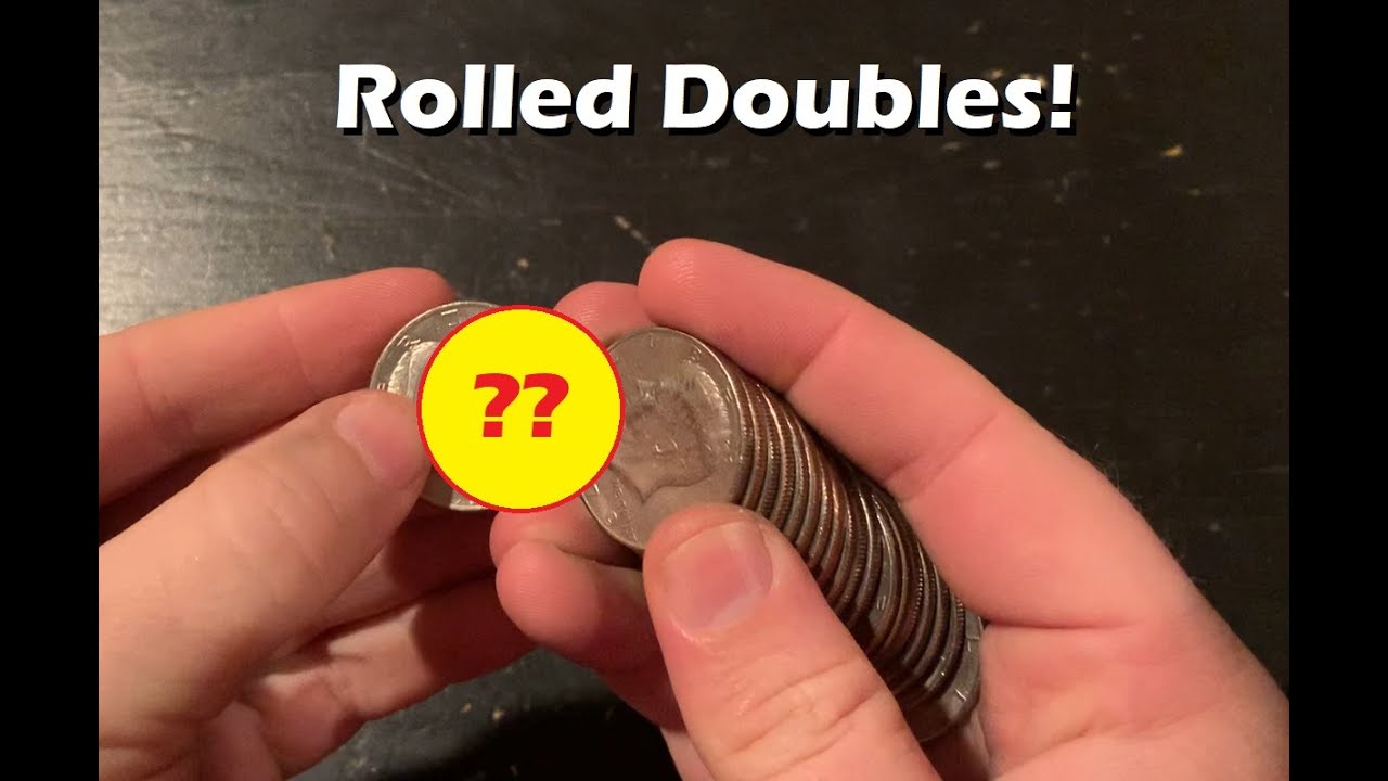 Man Roll Coin between fingers. Roller coin