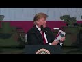 Trump displays charts and maps to champion successes