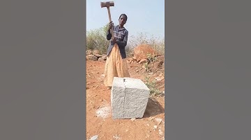 The process of splitting stone using a hammer #shorts