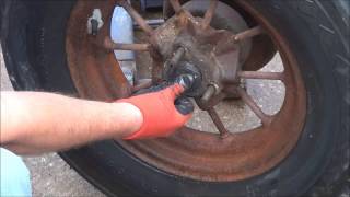 How to take Drive Wheel off of a John Deere Enclosed Type Clutch Lift plow