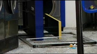 Man Hurt When Car Crashes Into Laundromat
