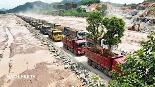 Great Project!! Dump trucks lined up, unloading rocks and soil from their beds—50 trucks at a time