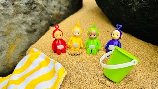 BEACH FUN with TELETUBBIES Toys Sand Bucket and Tropical Sunset