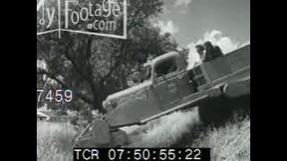 1940s Stunt Large Roller Truck with One Front Tire Rolls Over Man