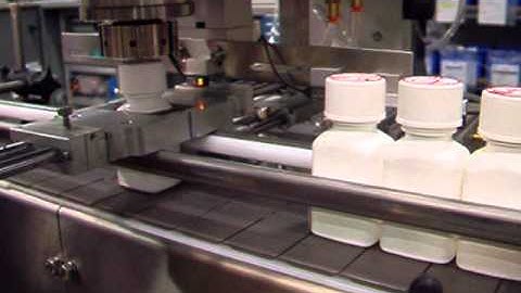 ST-Inline automatied torque tester with cap handling system