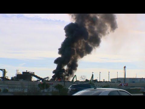Crews battle massive fire at recycling plant on southwest side - YouTube