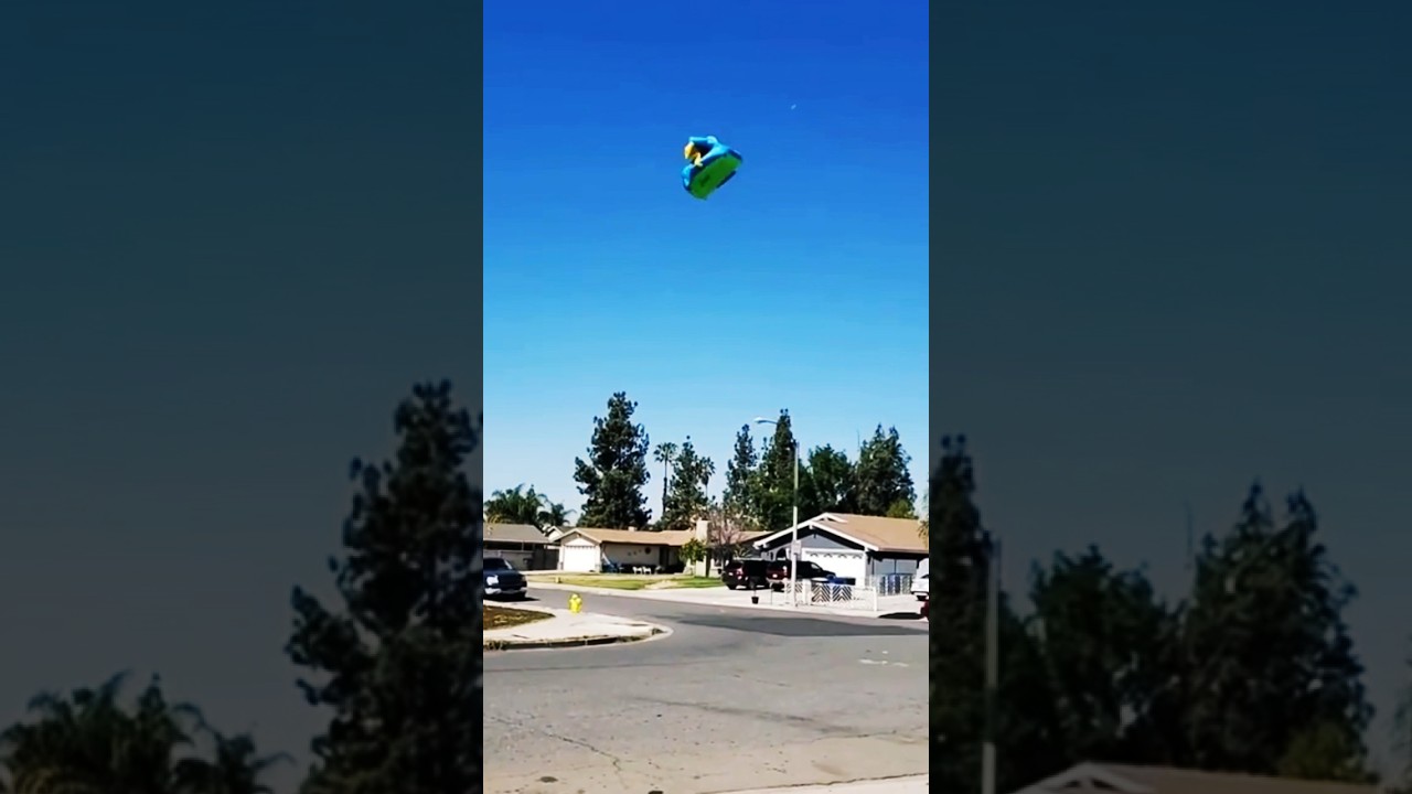Bounce house takes off in wind 