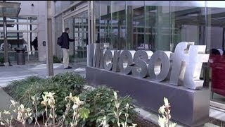 Microsoft posts loss but upbeat on future products