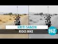 Watch: Kriti Sanon fulfills her dream, rides bike on sets of Bachchan Pandey