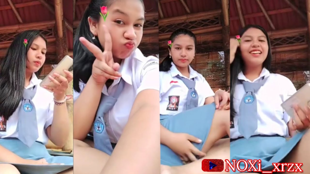 Anak sekolah.bersantai di saung. 