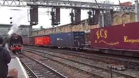 The Class 66 DB Cargo UK (EWS) No.66053 with Rail Containers was passed through at Carlisle.
