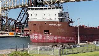 A close look at the Great Lakes Freighter Stewart J Cort passing by in the Soo Lock Canal