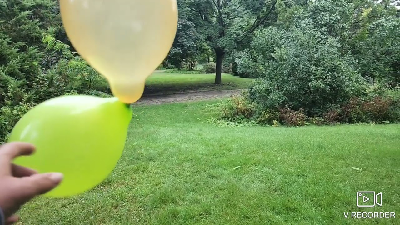 balloons vs. grass in SLOW MOTION