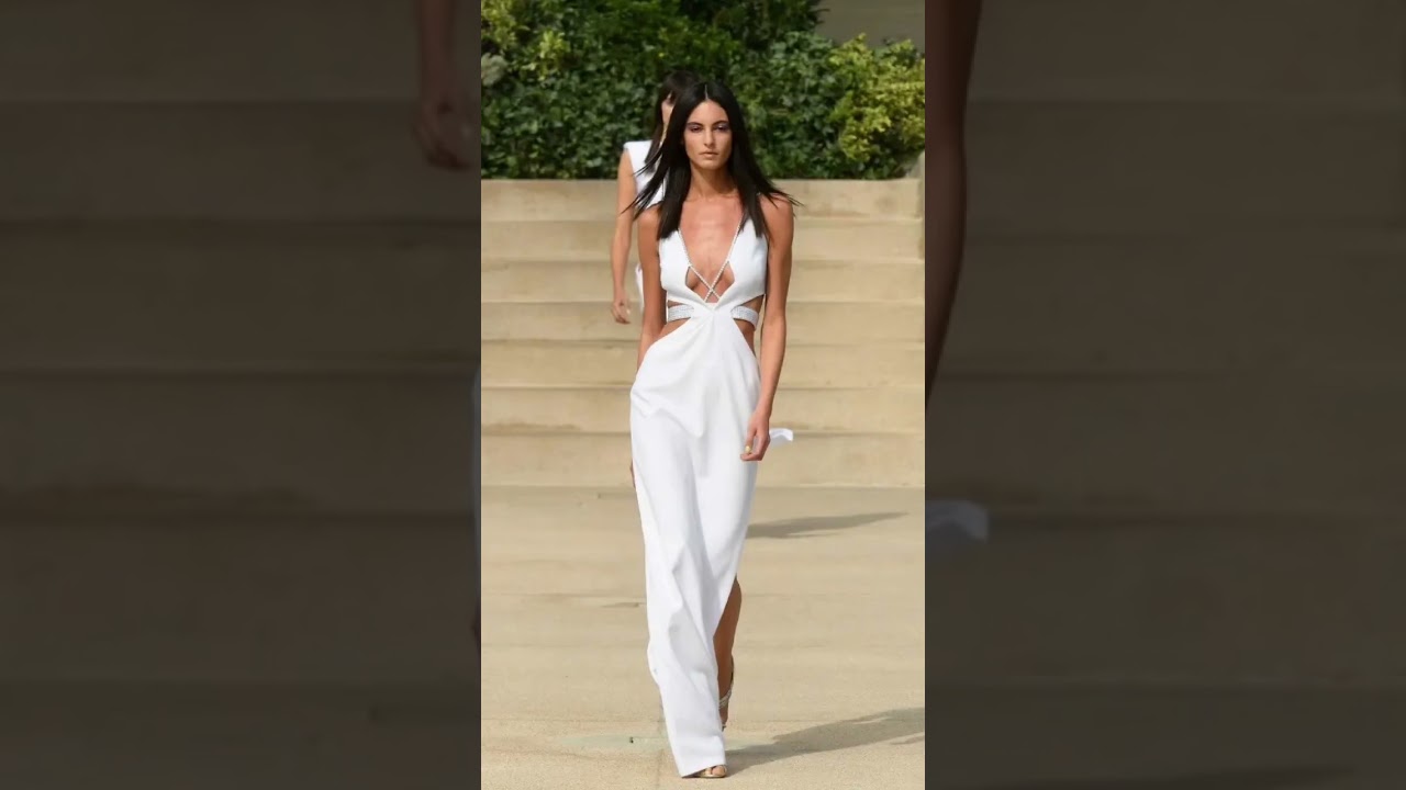Sleek Elegance: Striking White Cut-Out Maxi Dress for a Statement Look