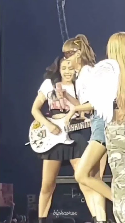 Rose playing guitar black pink