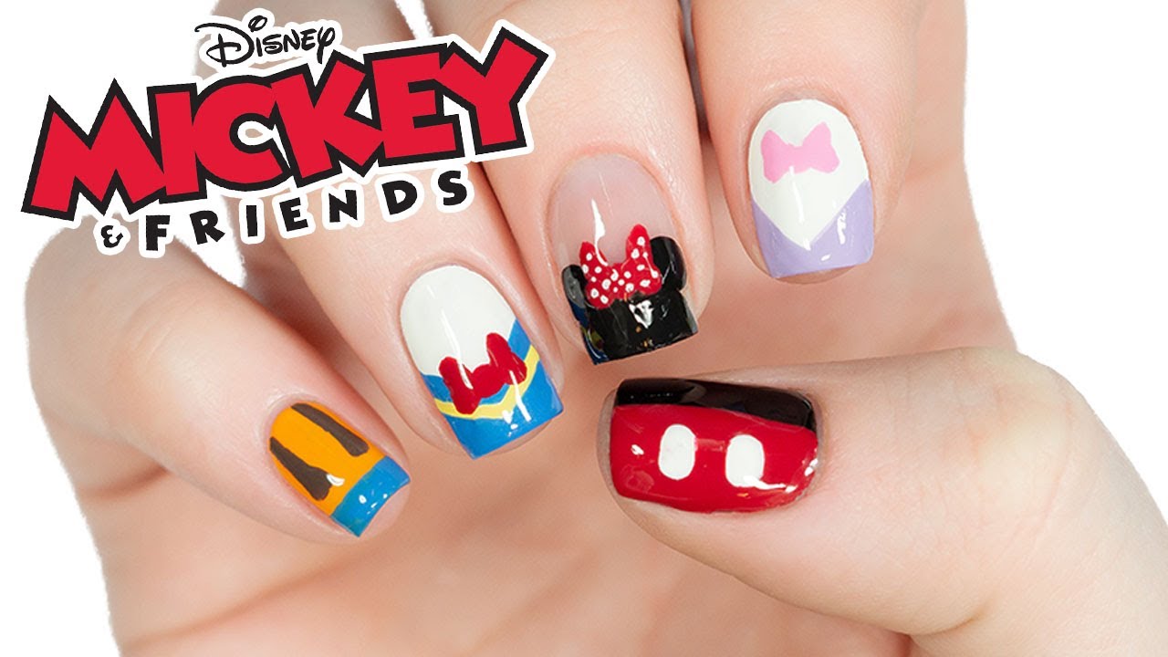 6. Black and White Mickey Mouse Nail Design - wide 8