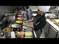 In the curry masters kitchen on a busy friday night  cooking curries at tiranga indian restaurant