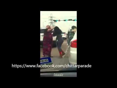 arab crazy girls fight on the road with traffic full hair transplant