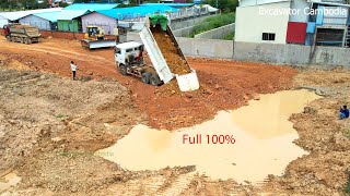 New Action Dump Truck Unload Of Soil Water Filling Repairing Road And Bulldozer Working Moving Soil