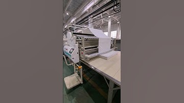 automatic spreading machine video for tubular fabric