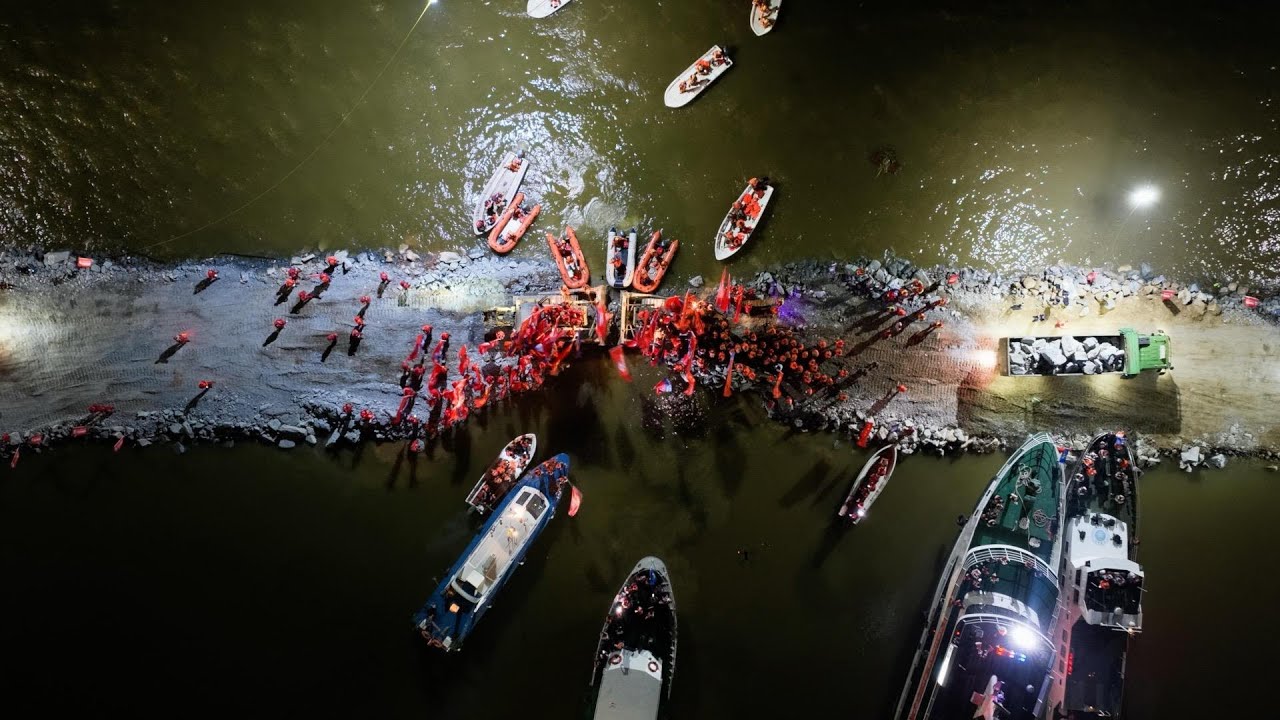 GLOBALink | China seals dike breach at its second-largest freshwater lake