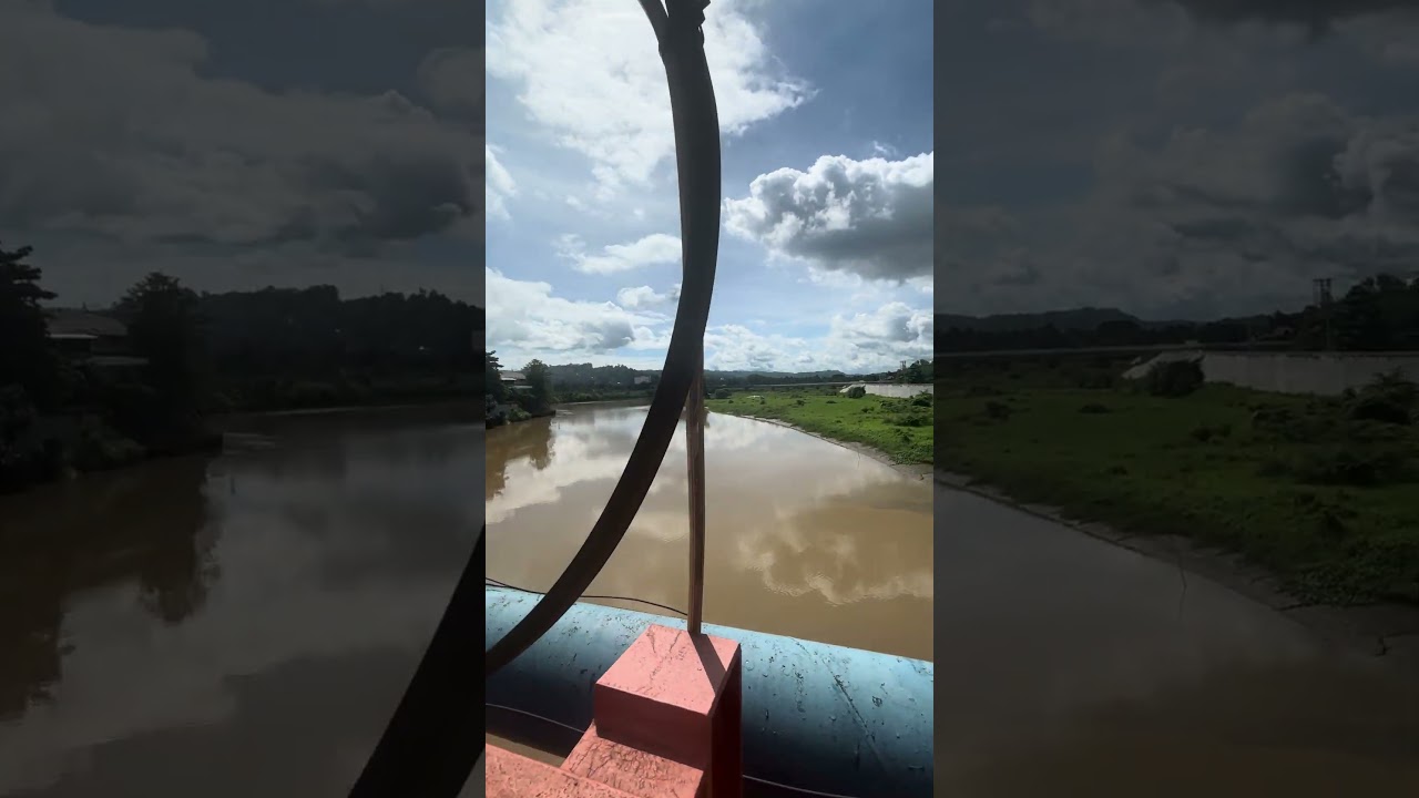 Walking on Ysalina Bridge, CDO — Filipina–Swedish couple.