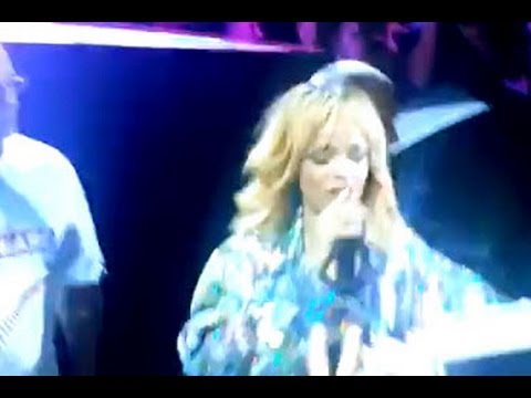 Rihanna Hits Fan In Face With A Mic at Concert -