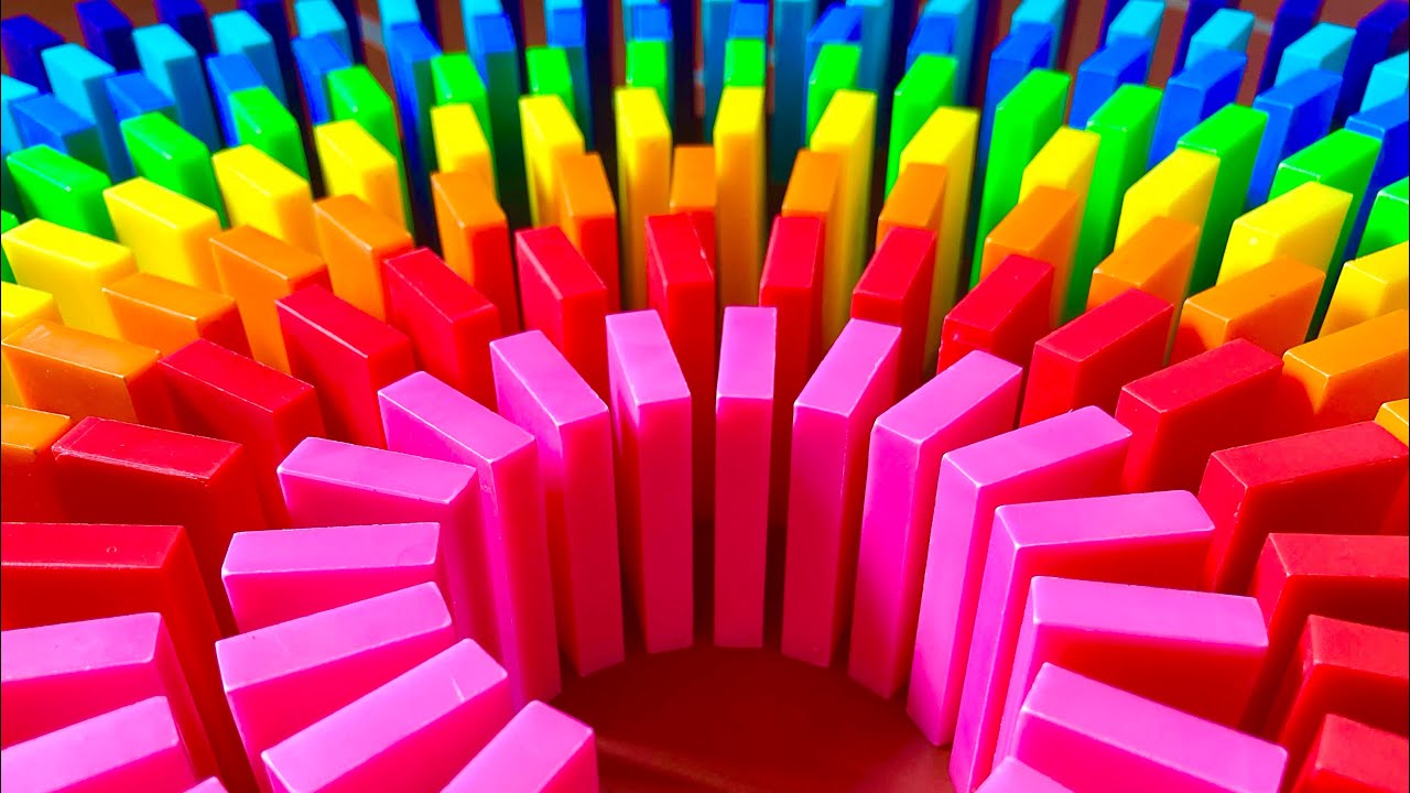 The Most INSANE Domino Tricks!