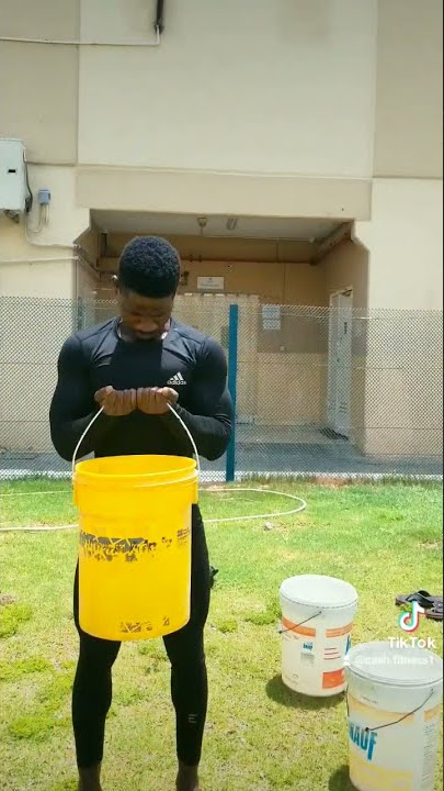 Demonstration: How a bucket makes a great shower in the Kalahari