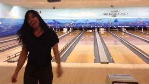 Jennifer bowling a strike!
