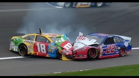 Busch and Logano crash at Kansas!