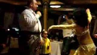 Fat man belly dancing