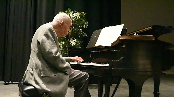 Norman Malone: Left handed pianist performs J.S. B...