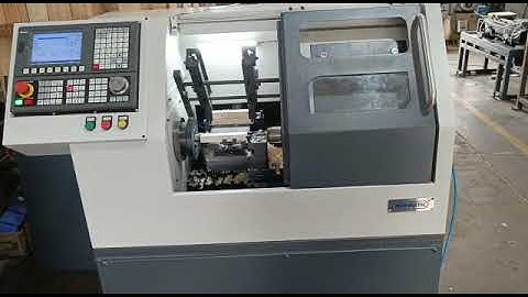 SPM CNC WOOD TURNING MACHINES CLAMPING AUTO LOADING AND UNLOADING