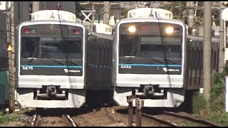 小田急線の代々木八幡駅を通過する3000形で運行の快速急行と快速の上下線