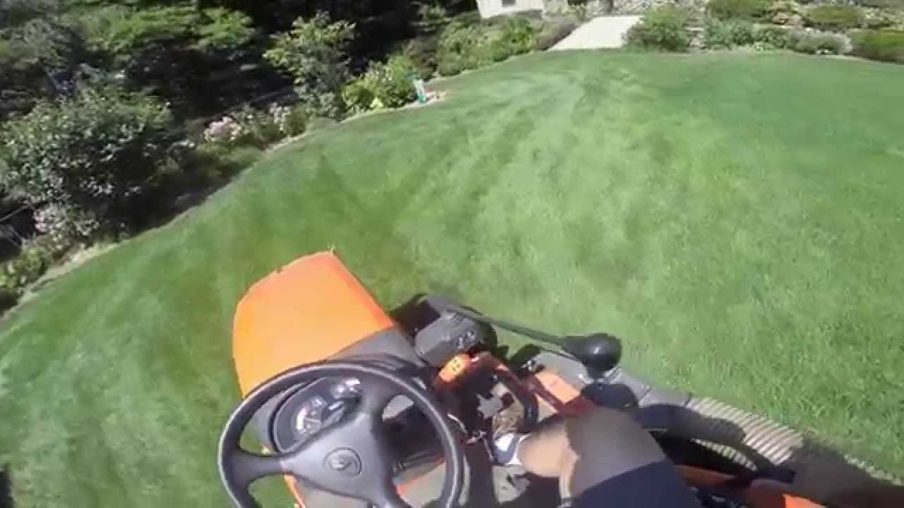 Kubota BX Mid Mount Mower,  cuttting grass