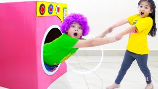 annie and harry pretend play with toy washing machine