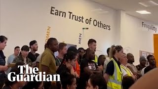 Hundreds of Amazon employees stop working over disputed pay rise