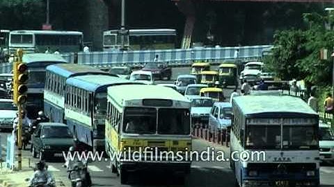 Archival footage of diesel DTC buses and traffic jams in pre-CNG Delhi