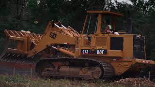 Cat 973 Track Loader Running Root Rake